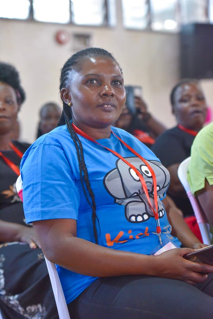 Frontline childcare worker and practitioner at a forum