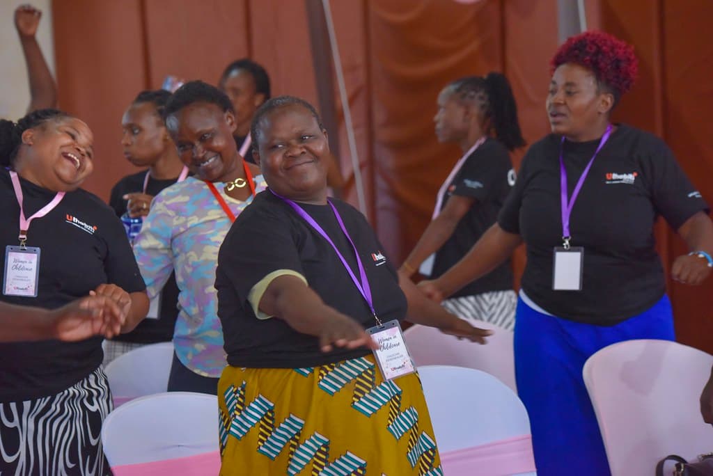 Uthabiti Childcare Professionals celebrating together at a Women in Childcare forum